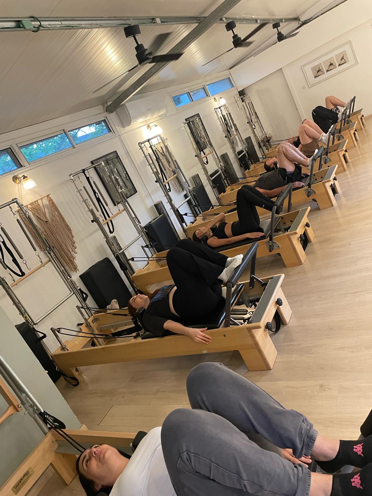 Roga Lach Pilates Studio - Gallery image 2 showing Pilates exercises and studio space